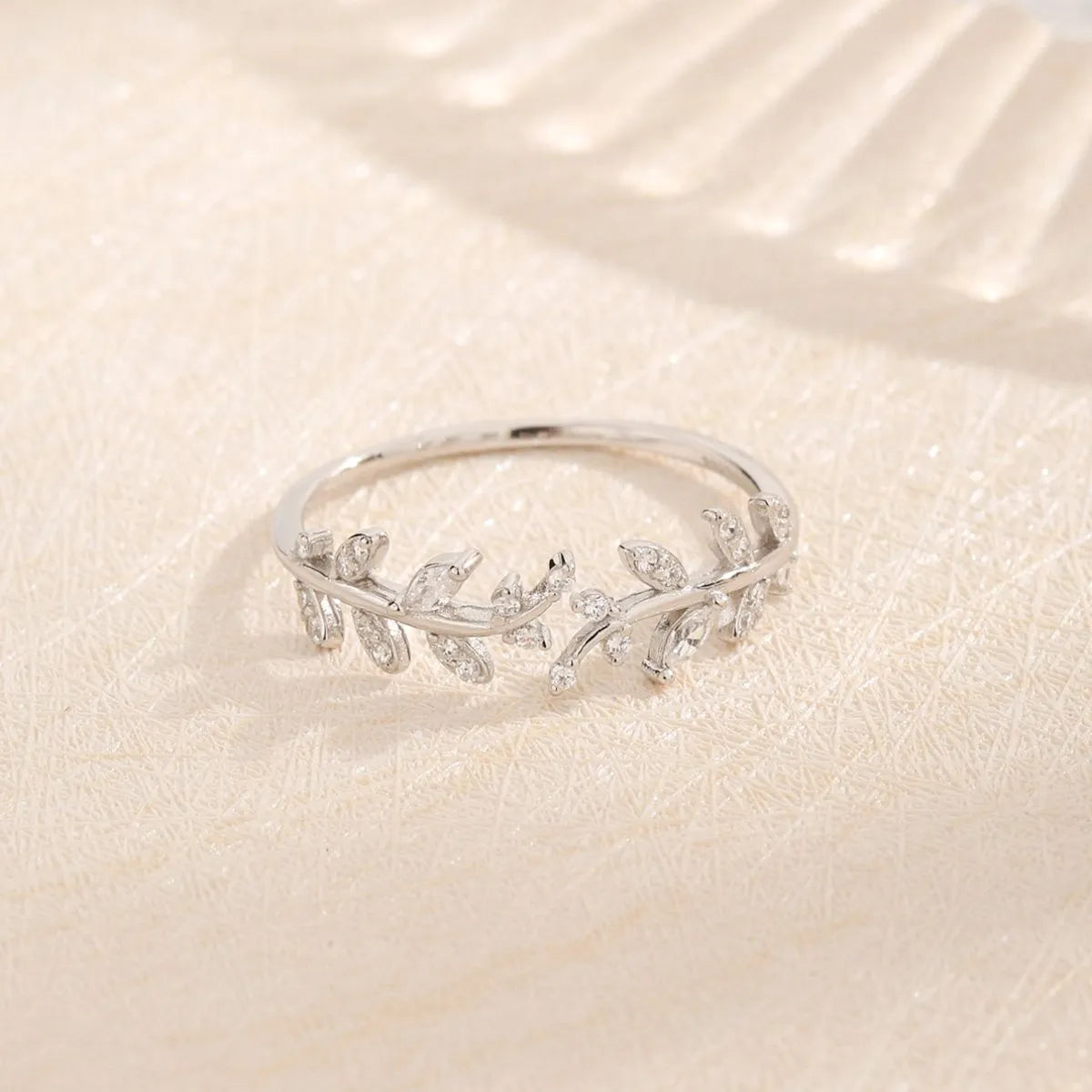 Trendsi stylish summer jewelry ring featuring a leaf design adorned with sparkling accents