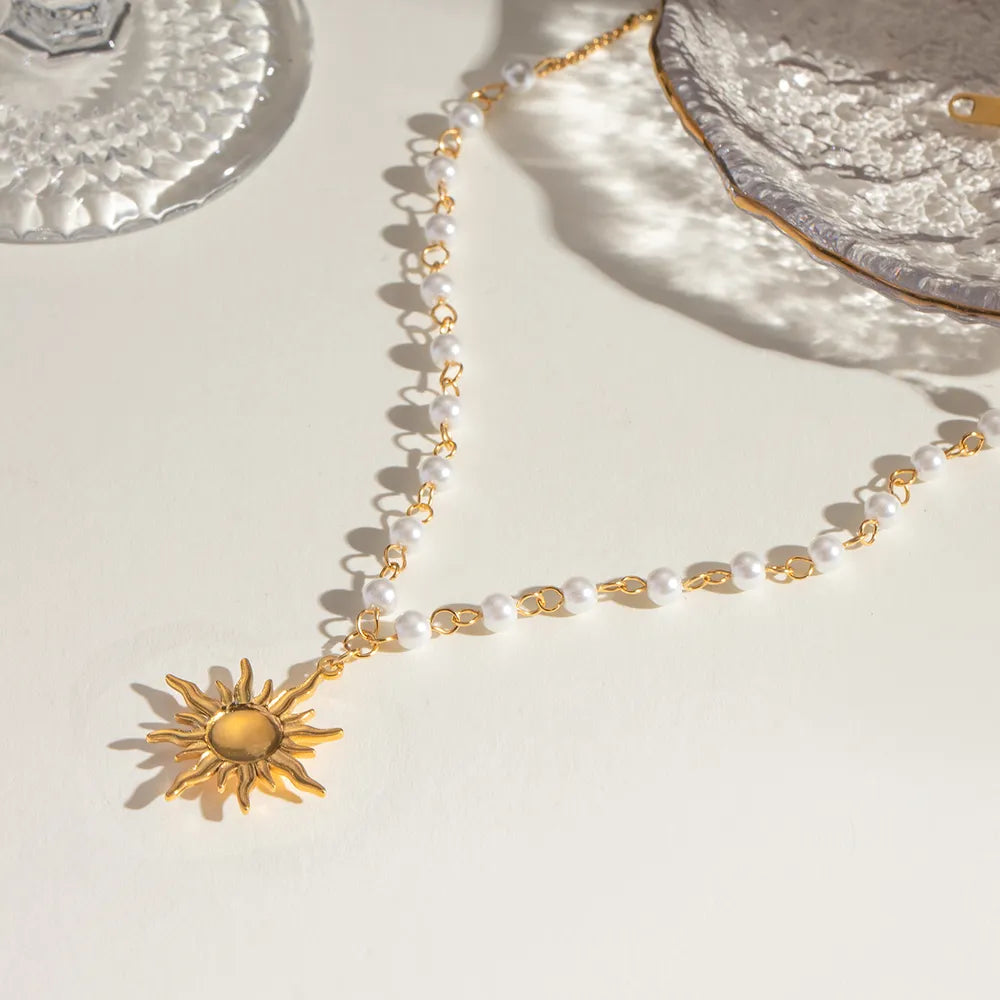 Trendsi Sun Charm Jewelry Necklace with Gold Sun Pendant and Pearls for a Stylish Look
