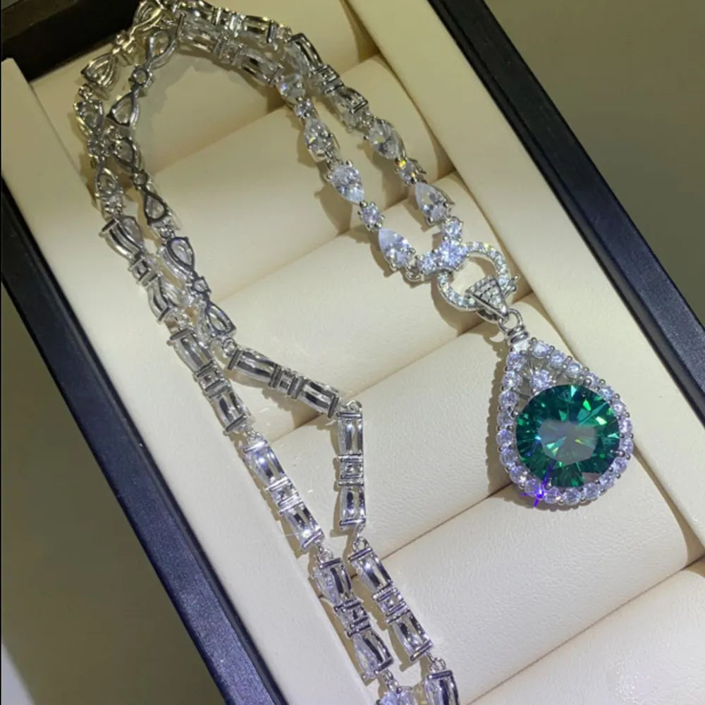 Elegant Teardrop Moissanite Pendant necklace with sparkling details on a luxurious display