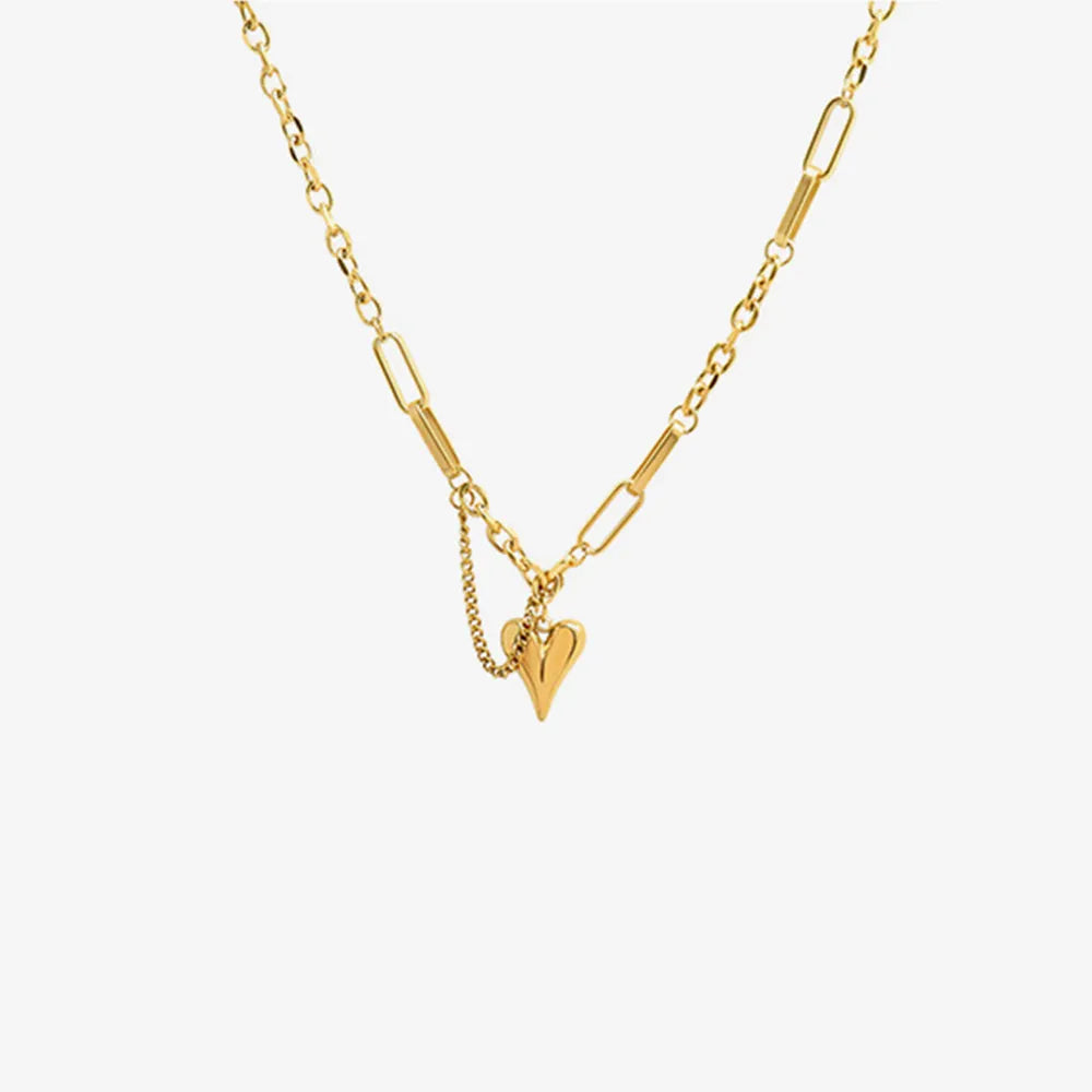Trendsi titanium heart pendant necklace on a gold chain, perfect for everyday wear and gifts
