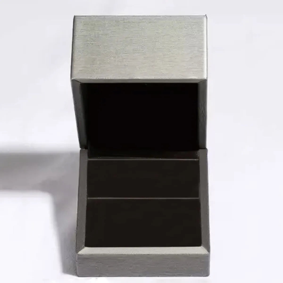 Trendy adjustable ring displayed in an elegant gray jewelry box with a soft interior