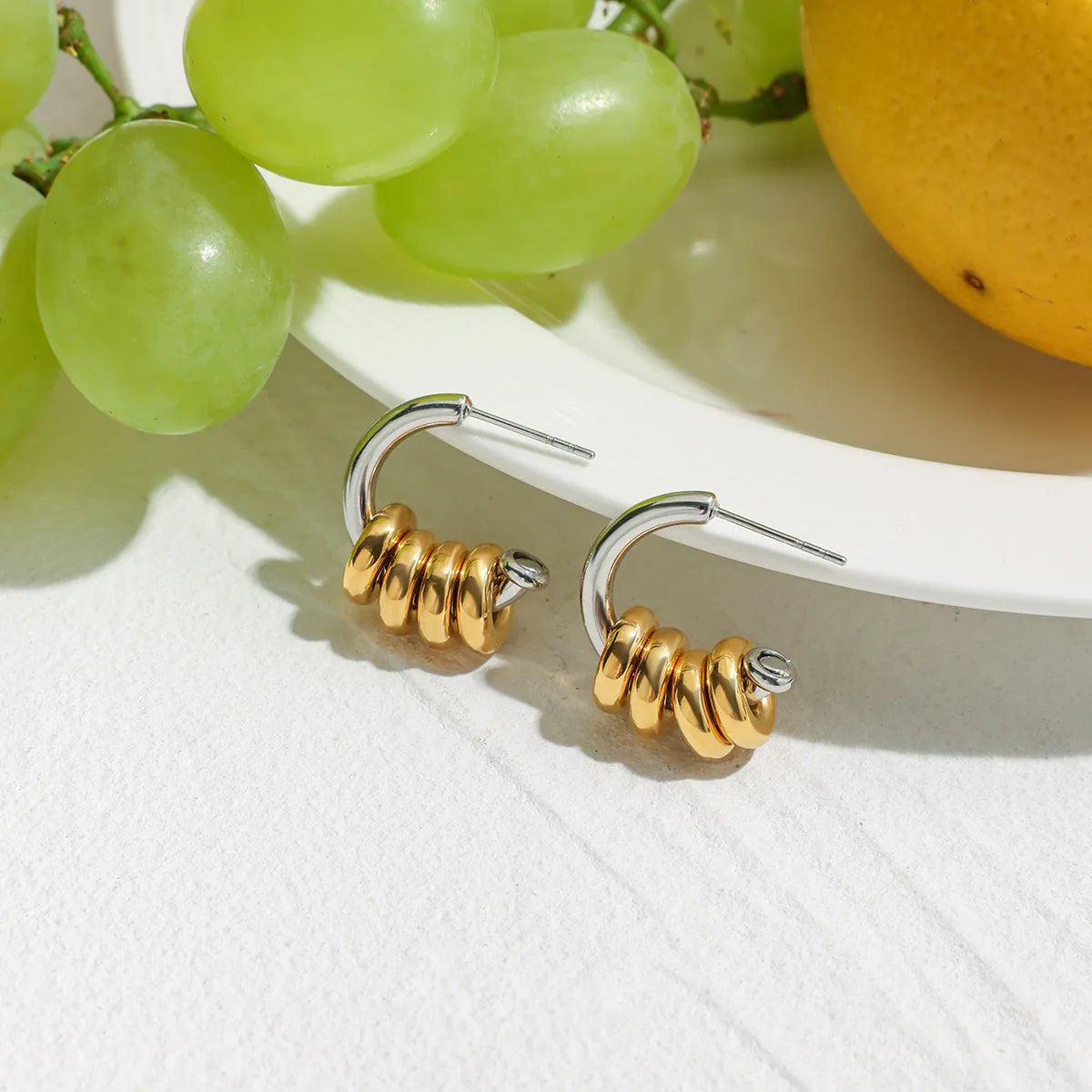Trendsi two-tone hoop earrings featuring a stylish gold and silver design for trendy outfits