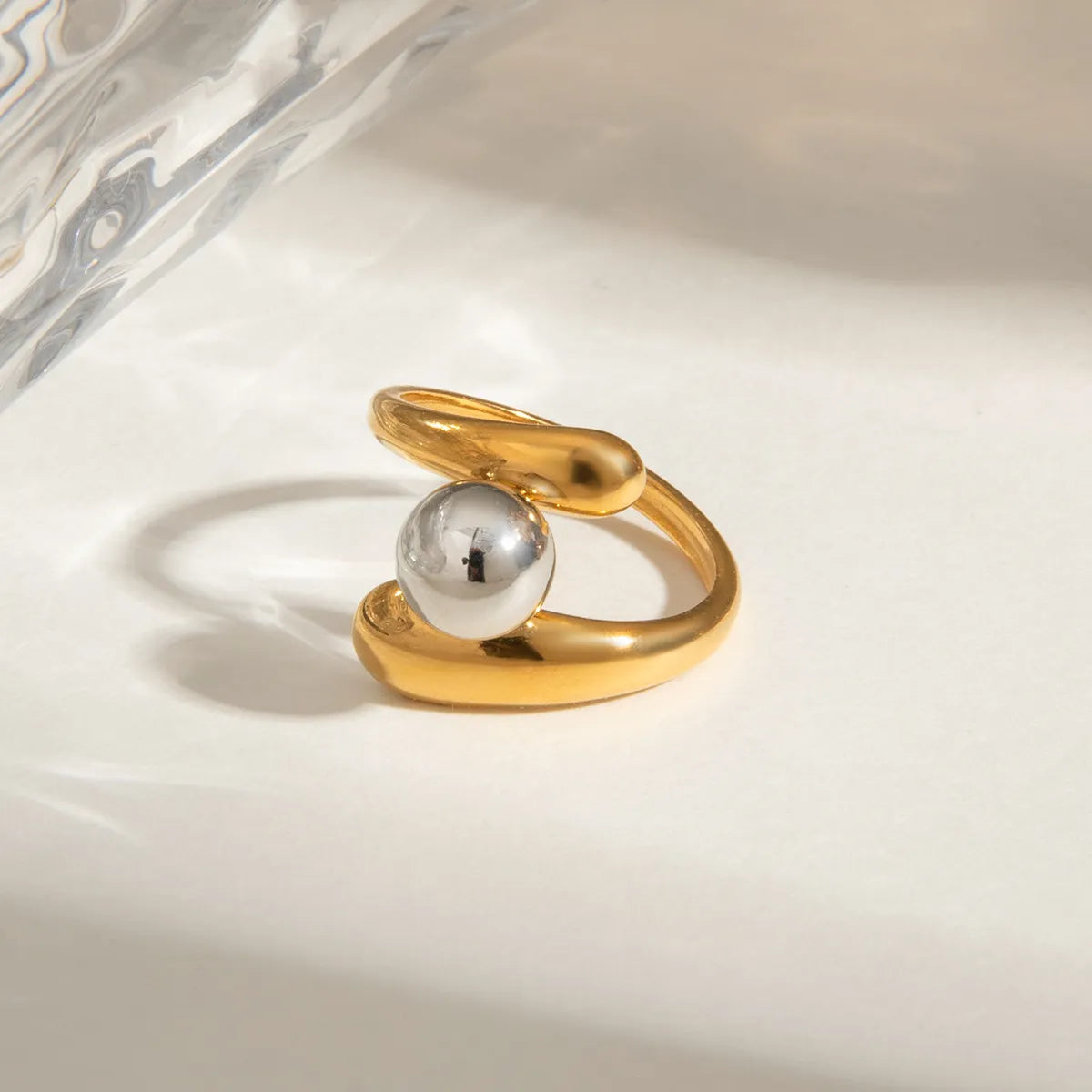 Trendsi Two-Tone Twisted Ring featuring a glossy gold and silver design for modern elegance