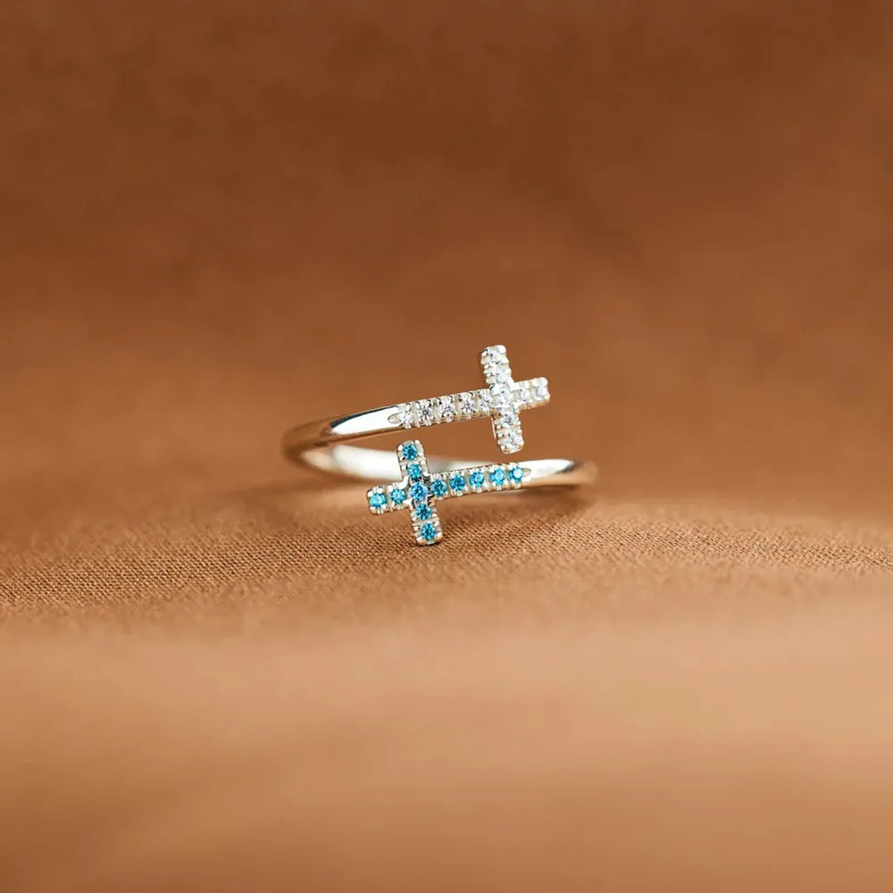 Unique Cross Design Silver Ring with Glittering Stones in a Stylish Arrangement
