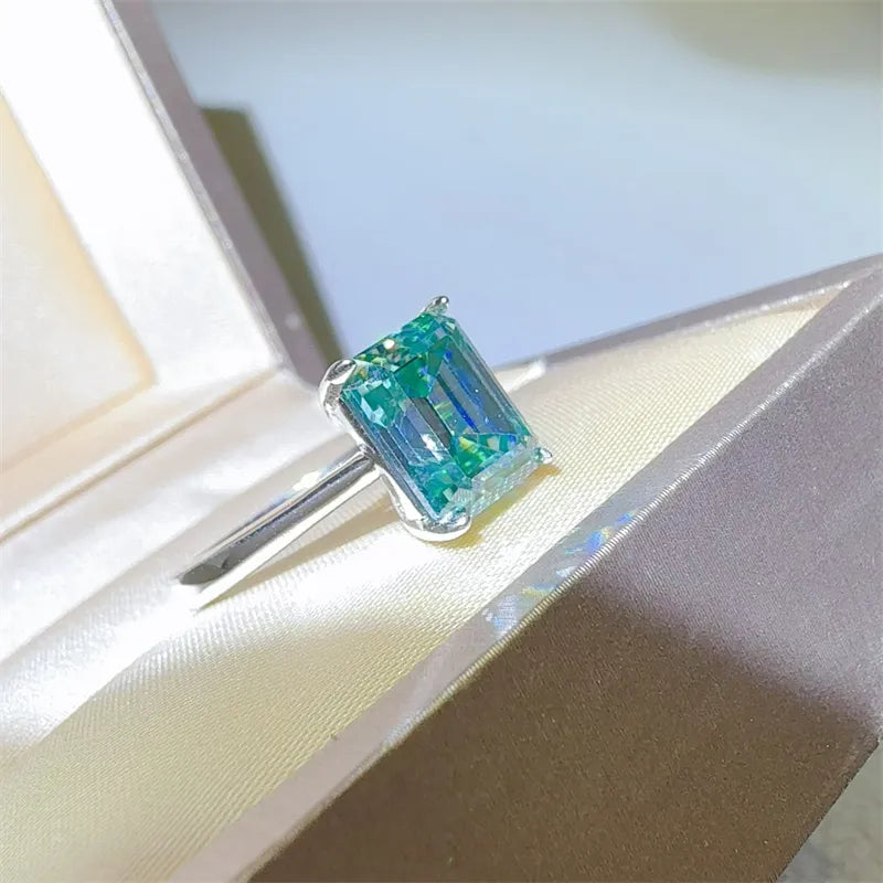 Stunning unique rectangle gemstone ring in blue and green hues set in a silver band