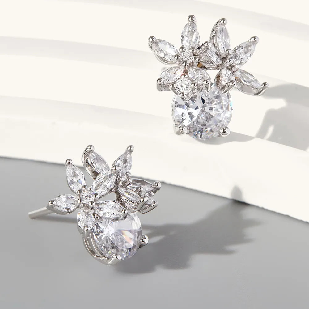 Elegant zircon flower stud earrings featuring shimmering crystals in floral design