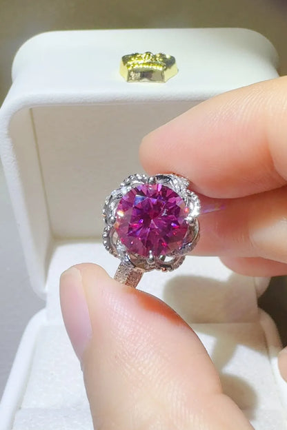 Trendsi 2 carat moissanite flower ring in vibrant purple displayed on a ring box