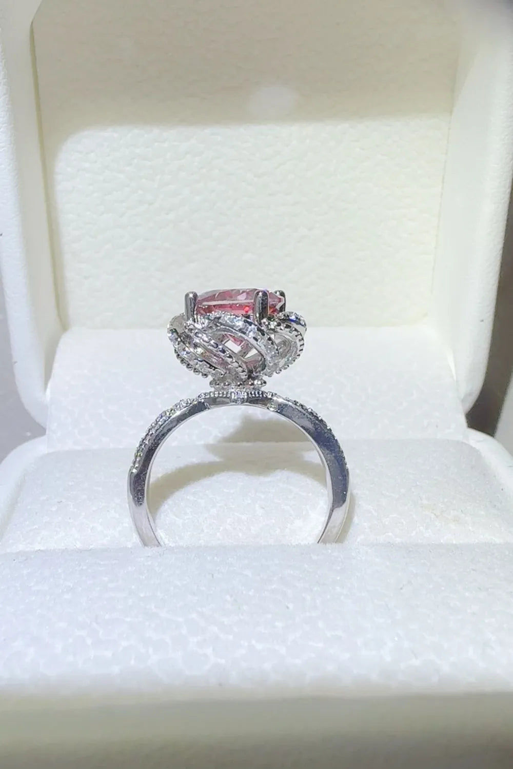 Elegant 2 carat moissanite flower ring set in a polished silver band, perfect for special occasions