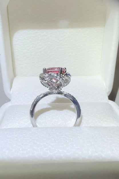 Elegant 2 carat moissanite flower ring set in a polished silver band, perfect for special occasions