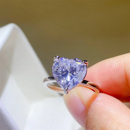 5 carat heart shape moissanite ring in silver setting, showcasing a brilliant sparkle and elegant design