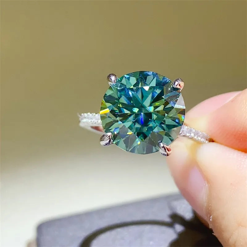 Stunning 5 carat moissanite ring in a classic solitaire setting with sparkling accents
