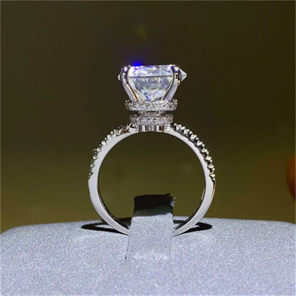 Elegant 5 carat moissanite ring with a sparkling center stone and detailed band design