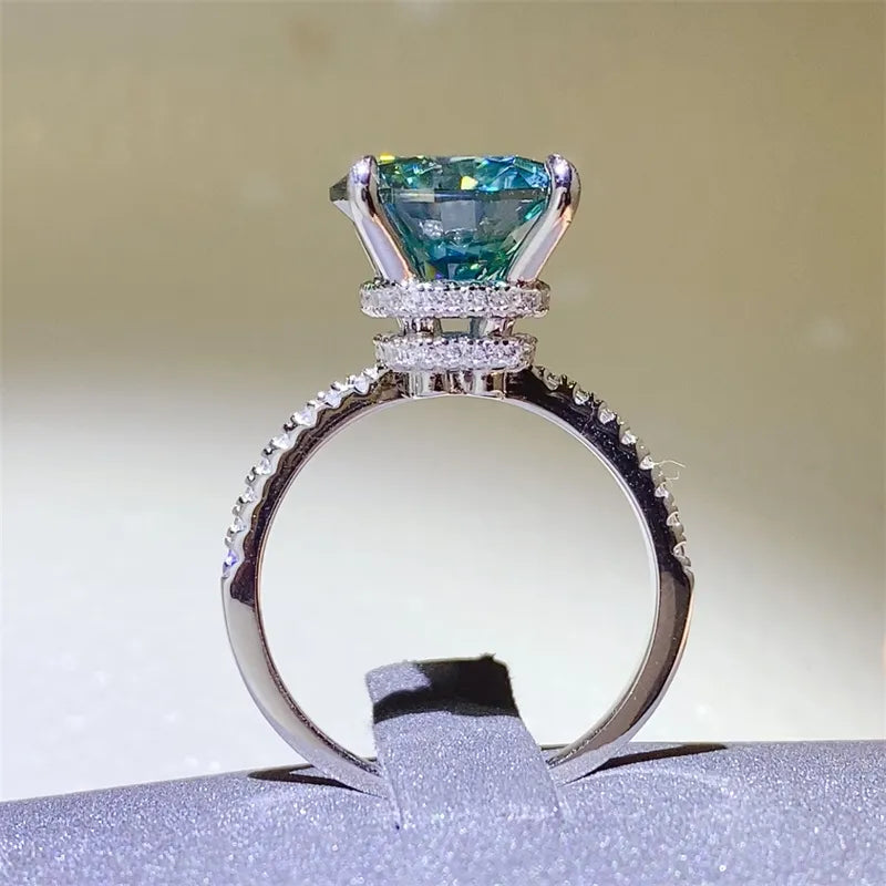 Trendy 5 carat moissanite ring with a stunning blue gemstone and diamond accents