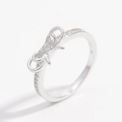 925 sterling silver bow ring with sparkling details on a polished band