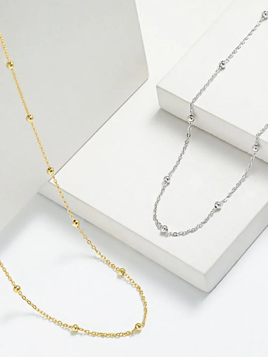 Trendsi 925 sterling silver necklace with a delicate design featuring gold and silver color options