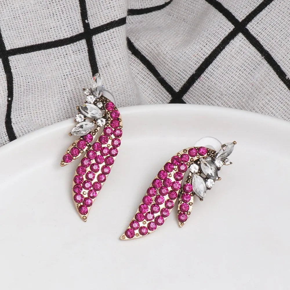 Trendy pink and silver affordable fashion earrings with sparkling gemstones for stylish looks