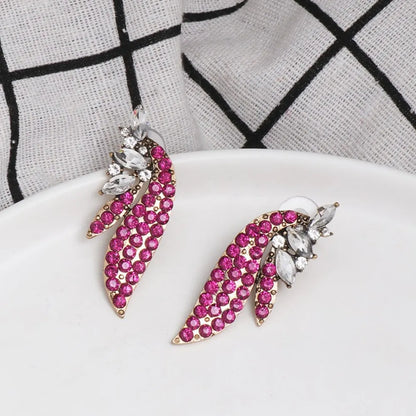 Trendy pink and silver affordable fashion earrings with sparkling gemstones for stylish looks