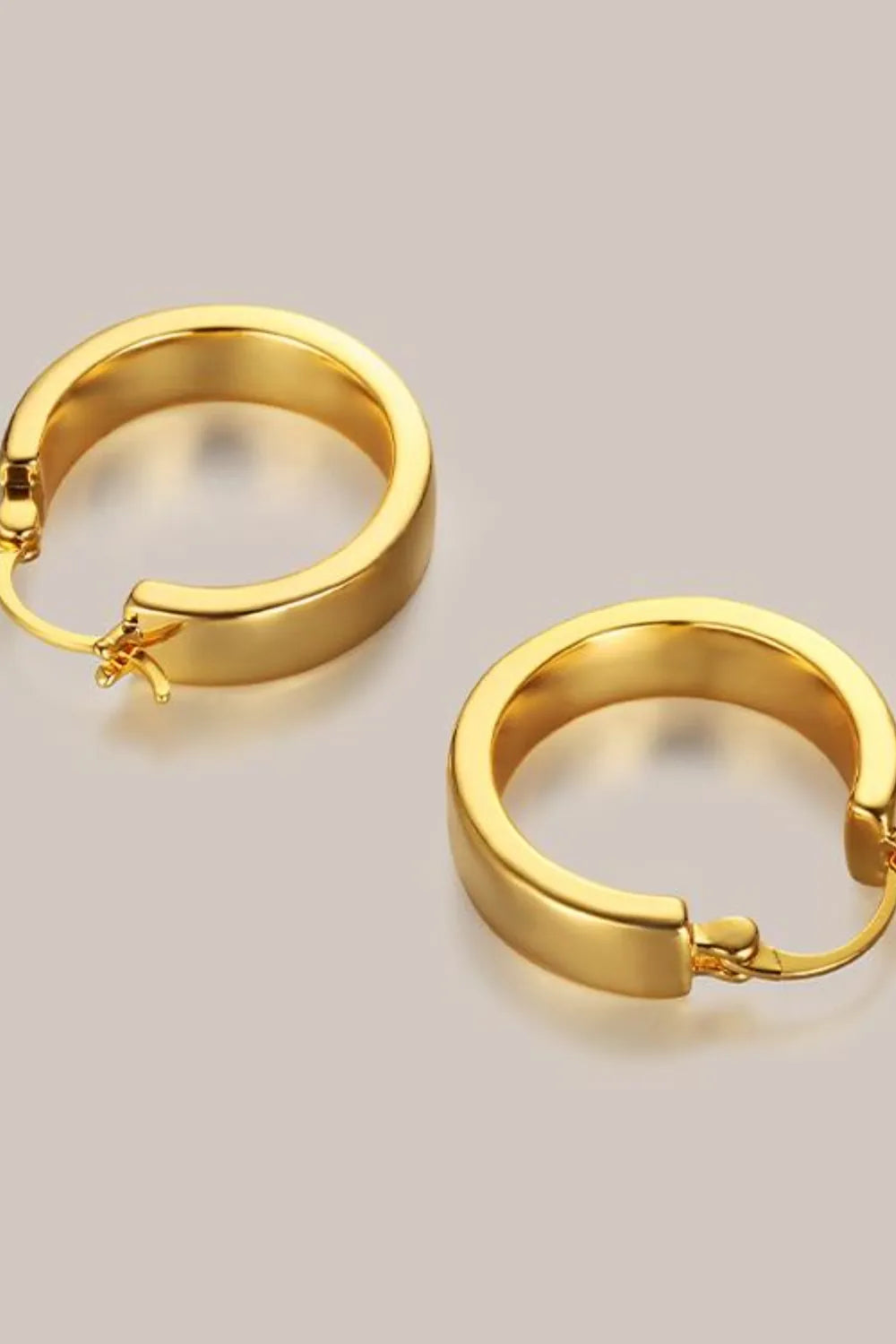 Affordable gold hoop earrings with a sleek design for everyday wear and versatile styling