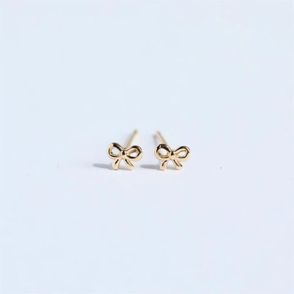 Trendsi copper bow stud earrings featuring a delicate bow design for elegant styling