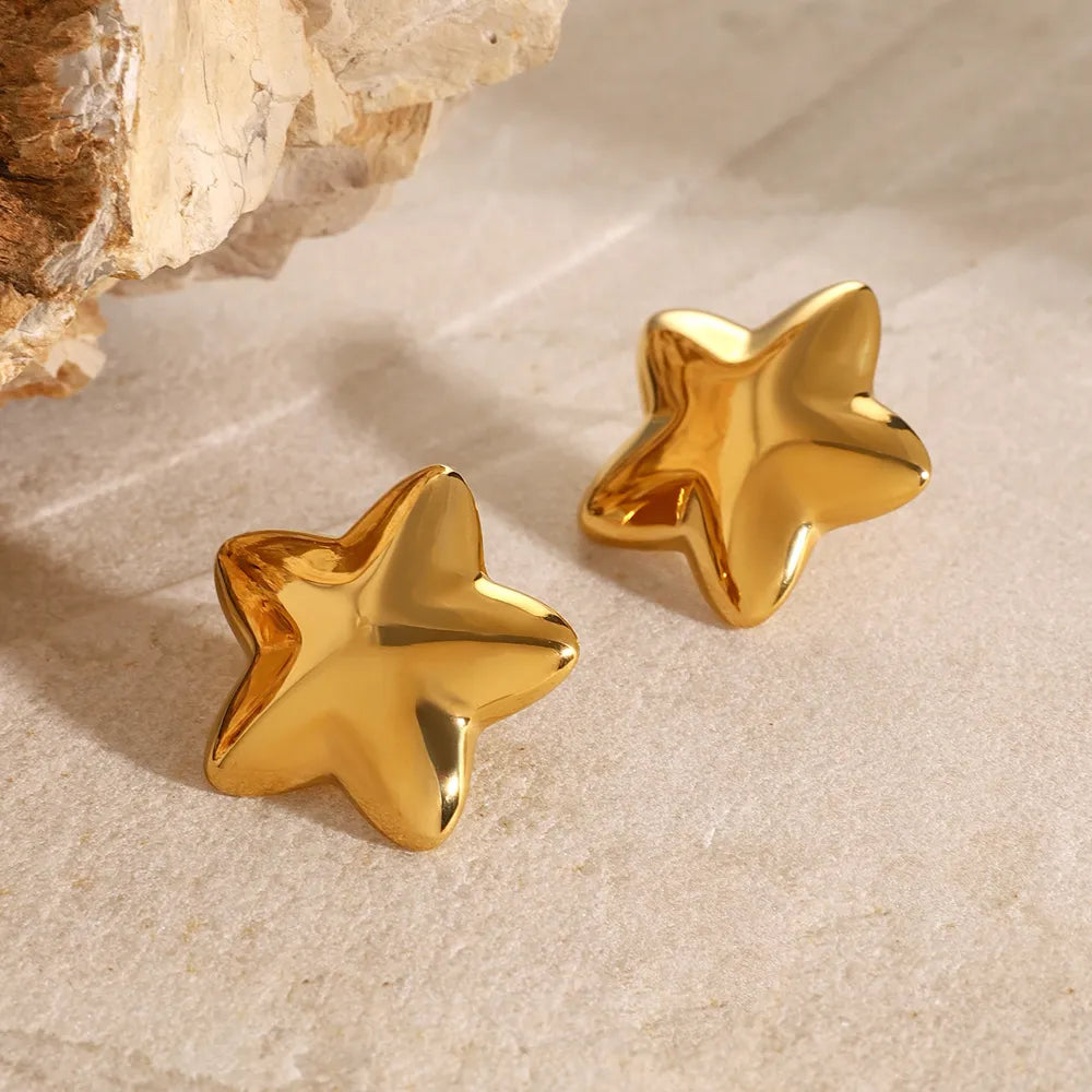 Trendsi Dazzle collection star earrings in gold with a shiny star-shaped design