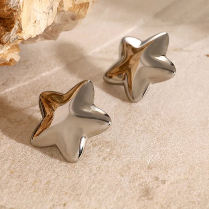 Dazzle collection star earrings in shiny silver, perfect for adding sparkle to any outfit