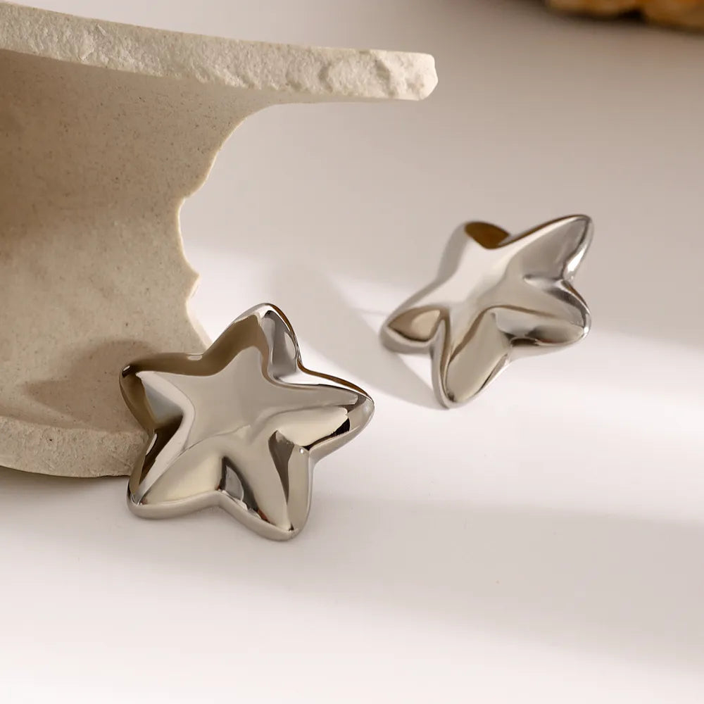 Trendsi Dazzle Collection Star Earrings in Silver with a Sleek and Modern Design