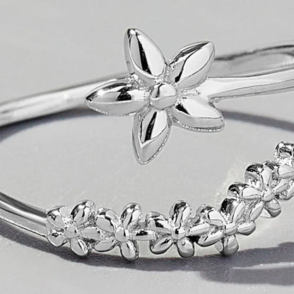 Delicate floral silver ring featuring a detailed flower design for an elegant touch