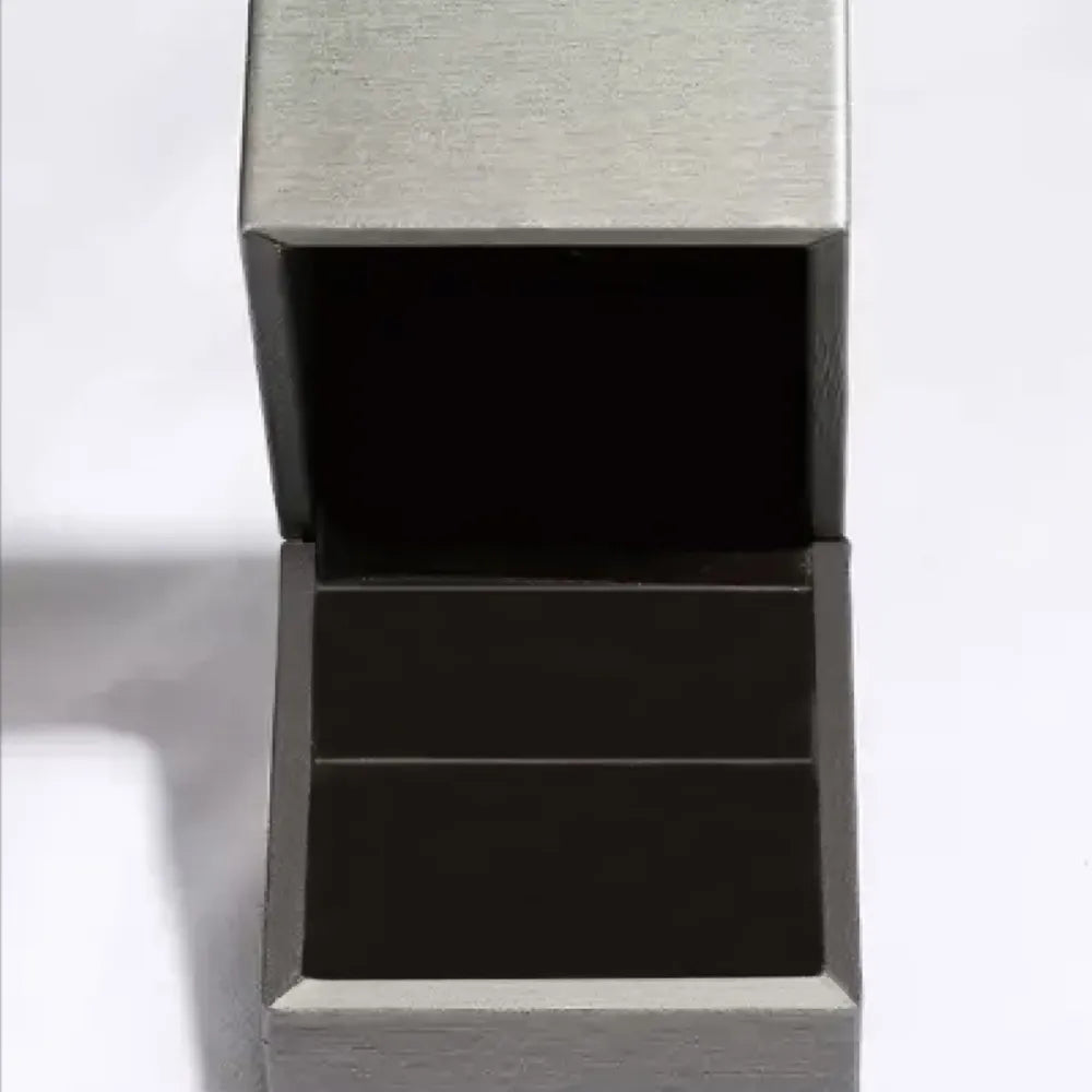 Empty silver jewelry box suitable for a delicate floral silver ring for gifts or storage