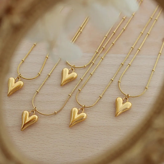 Trendsi durable heart pendant necklace in gold, featuring a unique heart design for everyday elegance