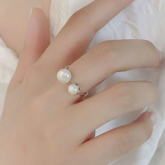 Trendsi elegant pearl jewelry ring featuring two stunning pearls on a delicate band