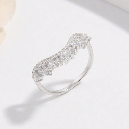 Elegant silver inlaid jewelry ring with sparkling clear stones for a sophisticated look
