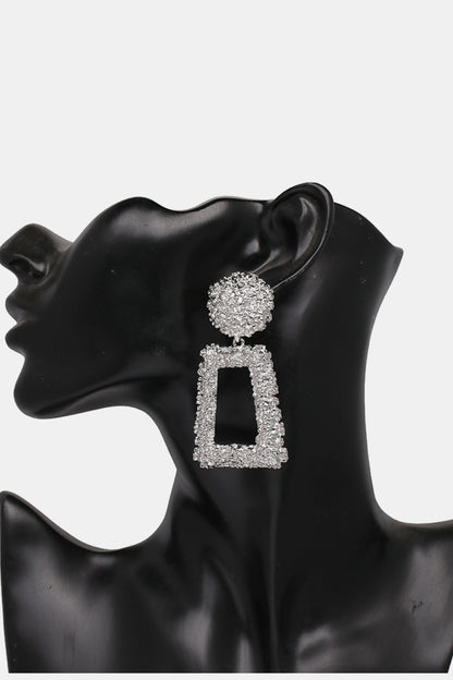 Trendy geometric dangle earrings in sparkling silver with unique shapes for a stylish look