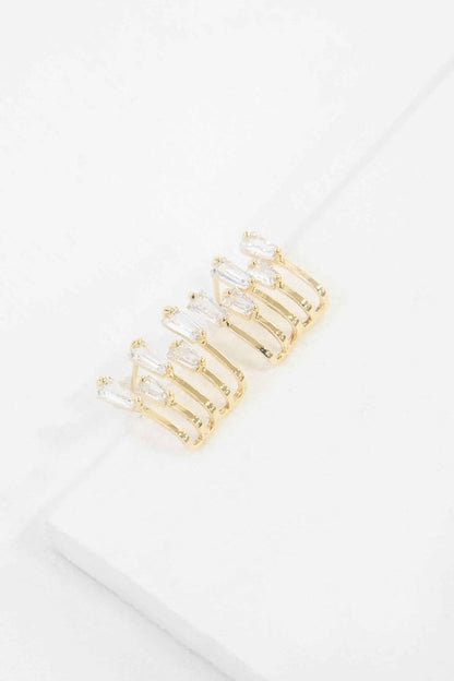 Lovoda gold kalimba earrings featuring sparkling crystals for a stylish and elegant look