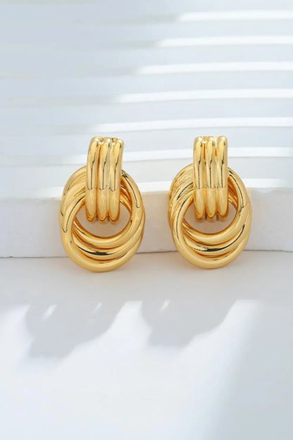 Trendsi gold-plated knot stud earrings featuring a unique intertwined design for elegant styling