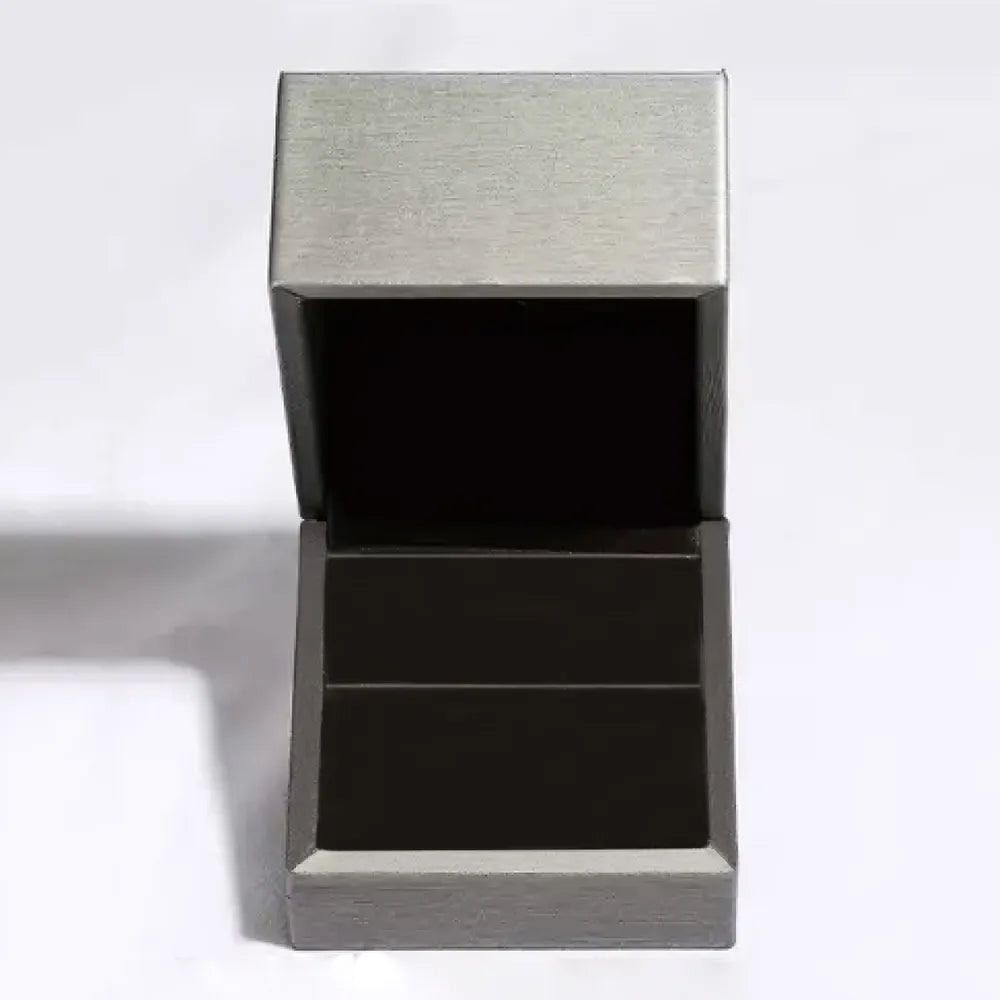 Stylish open jewelry box suitable for displaying a handcrafted gemstone flower ring