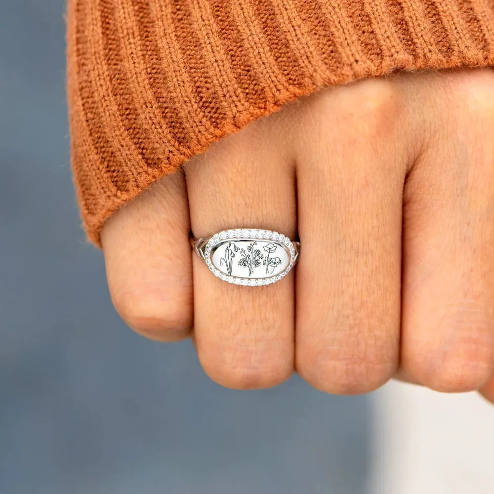 Trendsi handcrafted gemstone flower ring featuring an oval design with floral engravings