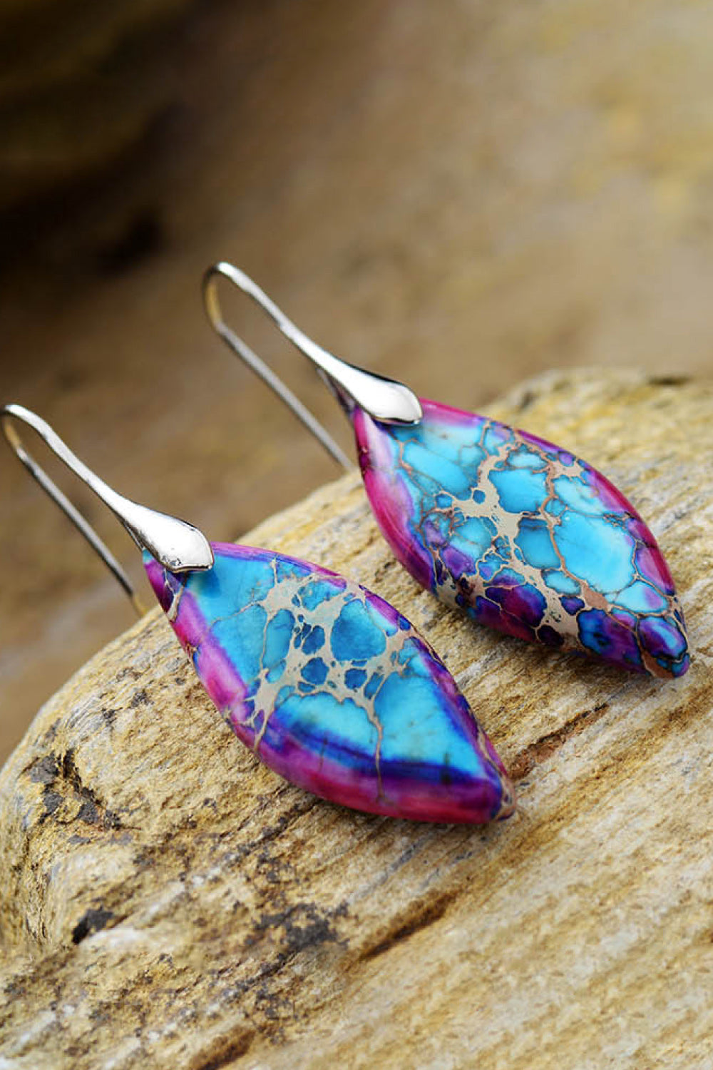 Handmade natural stone earrings featuring vibrant turquoise and purple colors for a unique style