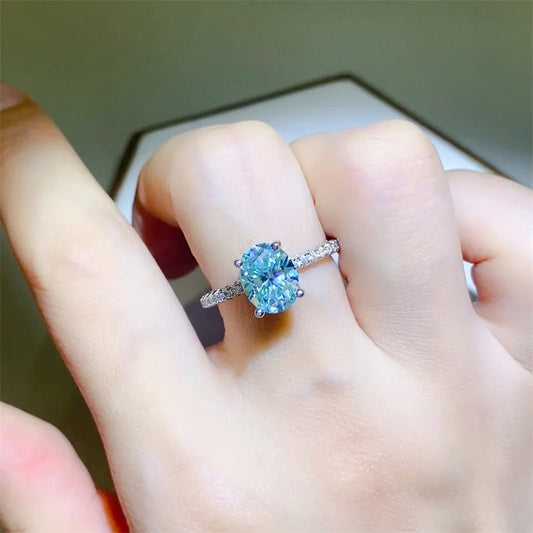 Trendsi 2 carat moissanite ring on a hand with sparkling accent stones