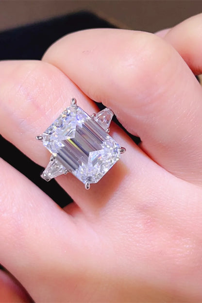 Elegant luxury moissanite jewelry ring featuring a stunning emerald cut stone with side accents