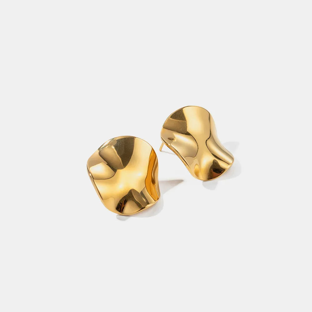 Trendsi modern gold stud earrings with a unique sculptural design for stylish outfits