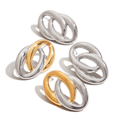 Trendsi modern twist hoop earrings in silver and gold with sleek intertwined design