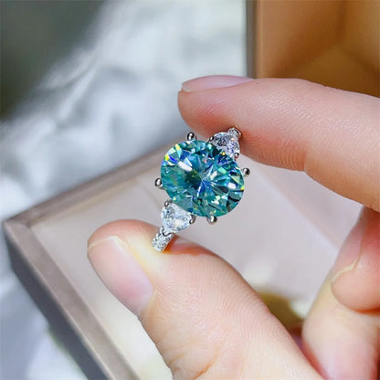 Elegant 5 Carat Moissanite Ring with sparkling blue stone and diamond accents