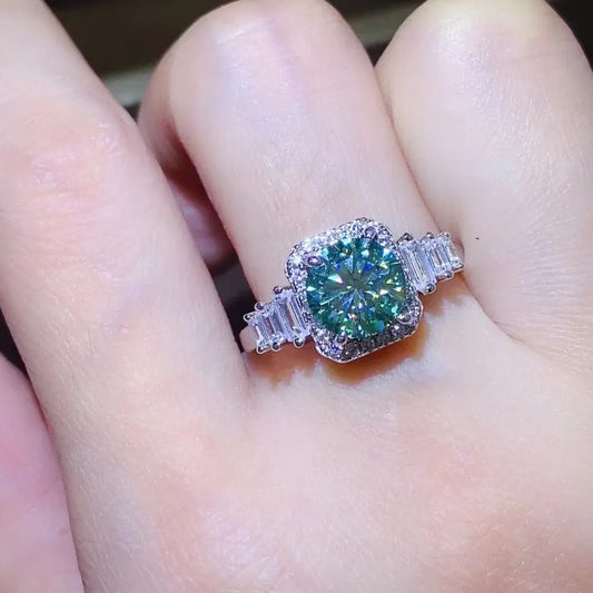Stunning 3 carat moissanite engagement ring with a brilliant green center stone and elegant band