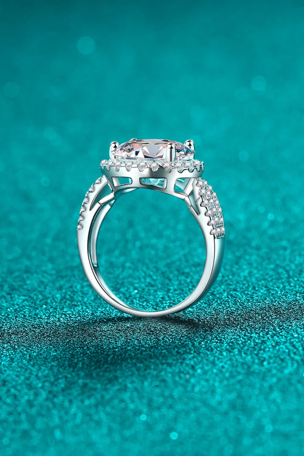 Trendsi Moissanite engagement ring with sparkling center stone and intricate band design