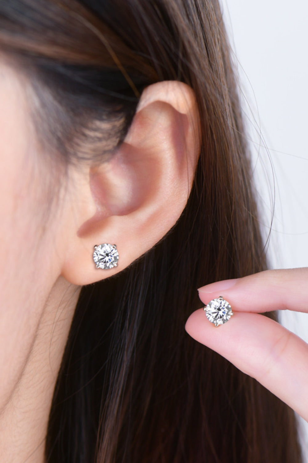 Trendsi moissanite stud earrings showcased on model with stylish and elegant design