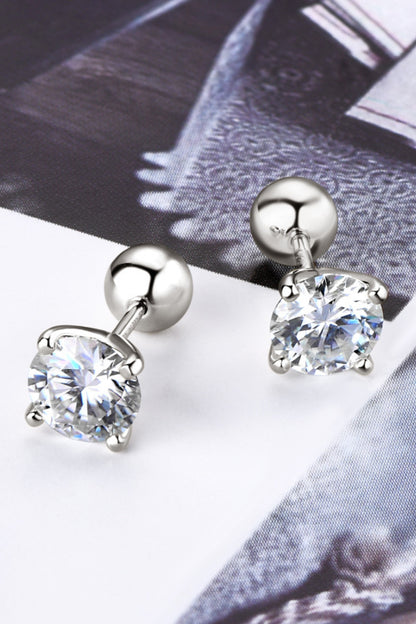 Trendy silver moissanite stud earrings with sparkling round stones for a timeless look