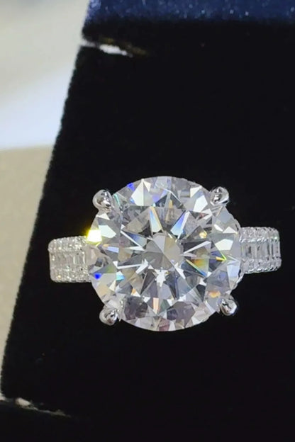 Stunning moissanite wedding jewelry ring with a brilliant round cut gemstone and sparkling band