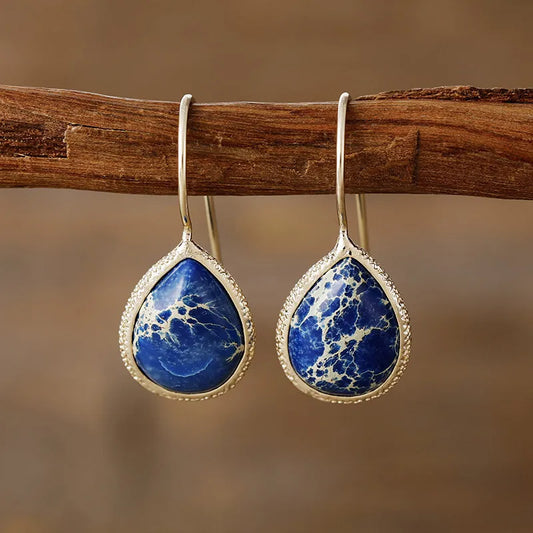 Trendsi natural stone drop earrings featuring a blue teardrop stone in a silver setting