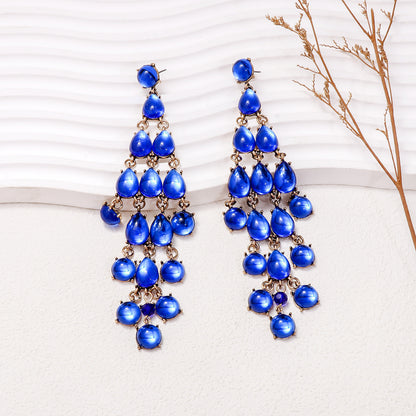 Elegant blue chandelier earrings featuring cascading teardrop stones for a stunning look