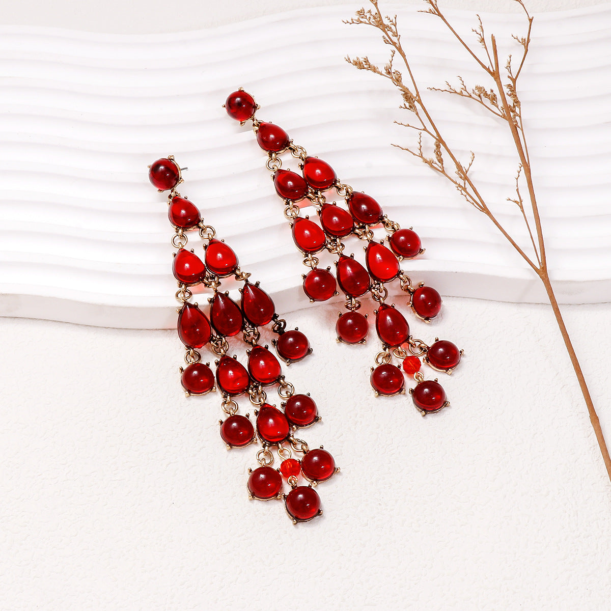 Trendsi red teardrop earrings featuring cascading design with gold accents for a stylish look